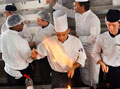 Cooking - A team of Chefs preapring a meal