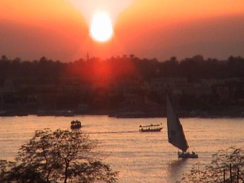 sun set in luxor - i caught it by myself,using videocam,on top of my hostel roof,very beautiful