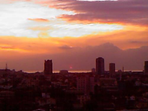 Sunset - This photo was taken when we used to live in a flat at the poshest city in the Philippines which is Makati.