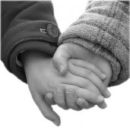 Holding hands - Image of two hands holding.