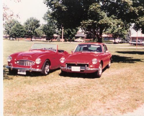 1960 Austin Healey Mark III, 1979 MGB GT - The car on the left is a 1960 Austin Healey Mark III and the one on the right I believe was the 1979 MGB GT.   The Austin Healey was a full ground up restoration, right down to the last nut bolt and washer! My father was able to get the full history on the car out of England. He used New Old Stock parts to restore it to like new factory condition. It had an aluminum body and a POSITIVE ground electrical system! It was thought that positive ground would help prevent rust from setting in? This car won first prize for paint at every car show that it was entered in. The paint job was $4,000 and consisted of primer, 4@ coats of paint, 6@ clear coats.  The 1979 MGB GT was also a full restoration again with documents from England. Again New Old Stock parts were used in the restoration of this car.