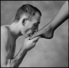 Man kissing a foot - Man kissing a foot.