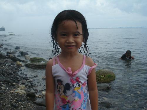 Jazel - this is the recent photo of my daughter taken last sunday when we went to the beach, she really had fun and she wouldn't get out of the water!:))