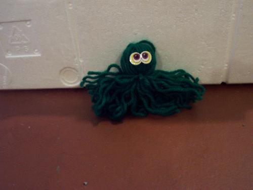 Alien Yarn Buddy - Green Alien Yarn Buddy with sticker eyes 'cause I can't get the darn googly eyes to work right.