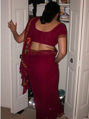 red saree woman... - moving away...