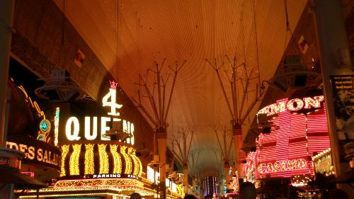 Fremont - Here's the entrance to the Fremont Street Experience downtown of the strip. Without the lights that are normally on for tourists, there's a sullenness surrounding the place's architecture. As you can see, some of the older casinos are stationed here such as the 4 Queens.