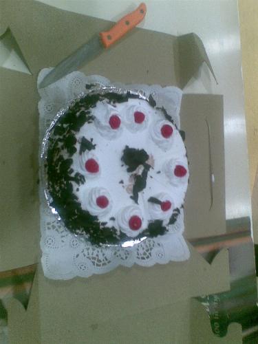 Birthday Cake - Yummy! My friends did not leave even a single grain of it. Most of them were seen licking their hands. Shhh! and even the board on which it was kept.