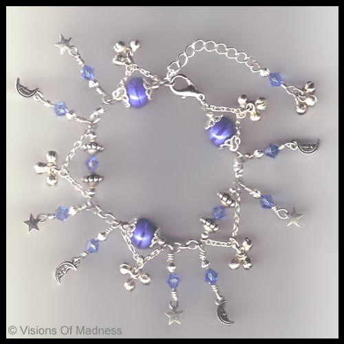 Bracelett - silver chain,blue beads,silver beads and silver bells bracelett.