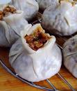 shaomai - we call it shaomai . it's made of sticky rice and youcan see people always put some steing bean on it.
