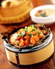 lotus leaf rice - the rice are enveloped by the lotus leaf and will be put in food steamer.\ then the rice will have the fragrance oflotus leaf.