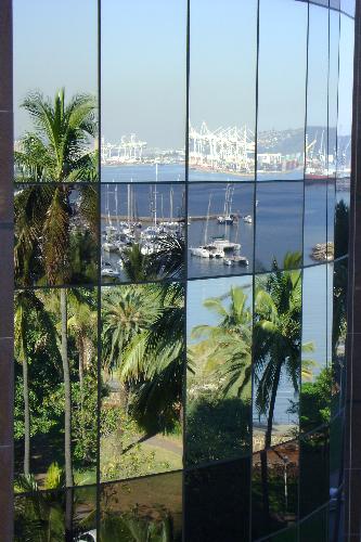 Reflections - Durban Harbour - This great photo was taken by my father and is a reflection of Durban Harbour on one of the new glass buildings. I thought it was quite artistic and that you might enjoy it. Do you have any artistic photographs that you have taken?  Violetdreams