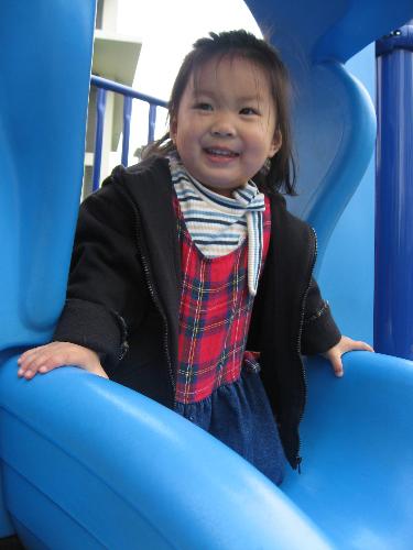 playground slide - little girl like sliding.