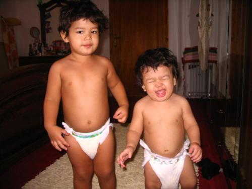 Toddlers pose before bath time - These are my two boys, sam and leaf. They are ready for a bath but still want to pose for the camera. It took me 15 minutes to convince them to go to the bathroom. They kept on playing and wanted me to keep taking photos of them. They are age 1 and 2. They are my life. So cute!