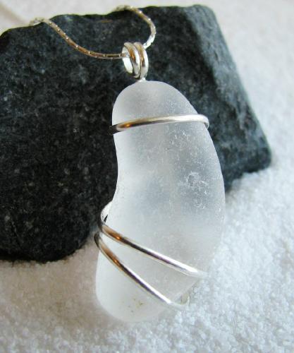 Wire-wrapped White Sea Glass - This piece sold within days after listing it on Etsy. Just a simple, basic wrap. It was important to learn that the type of wire is very important when it comes to wrapping sea glass.
