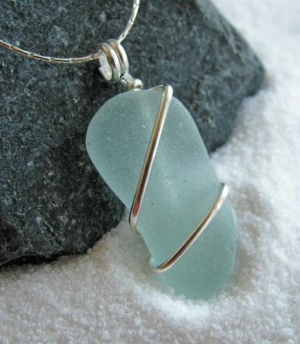 Soft Blue Sea Glass Necklace - Another basic, simple wire wrap on a beautiful frosty light blue piece of NJ sea glass. This piece was found by my hubby on Long Beach Island this past summer and spent decades in the ocean turning from a discarded piece of trash to this beautiful frosted, jewelry-quality piece of sea glass. Soft Blue sea glass is considered to be Uncommon and jewelry-quality pieces are becoming extremely hard to locate. Available in my shop at Etsy.com