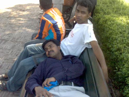 group 8 - got tired after a long walk nearly 2 kilo meters.taking rest under the tree.