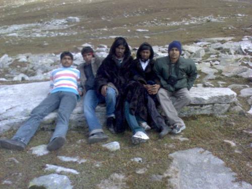 group 10 - sitting over the stone over the mountains