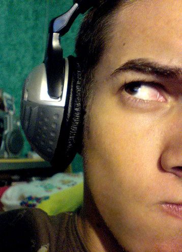 Talking about sound trip - A cool guy with a headphone, listening to his favorite tune.