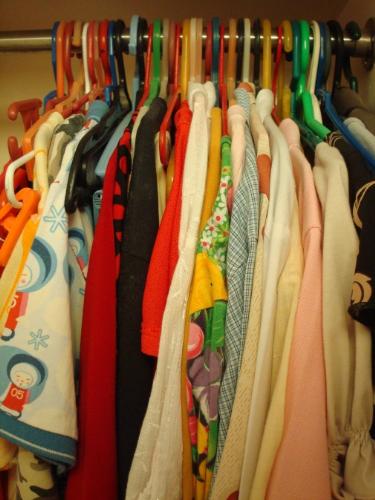 Clothes - Clothing (also called clothes, accoutrements, accouterments, or habiliments) protects the human body from extreme weather and other features of the environment. It is worn for safety, comfort, modesty and to reflect religious, cultural and social meaning.  The practical function of clothing is to protect the human body from dangers in the environment: weather (strong sunlight, extreme heat or cold, and precipitation, for example), insects, noxious chemicals, weapons, and contact with abrasive substances, and other hazards. Clothing can protect against many things that might injure the naked human body. In some cases clothing protects the environment from the clothing wearer as well (example: medical scrubs).  Humans have shown extreme inventiveness in devising clothing solutions to practical problems and the distinction between clothing and other protective equipment is not always clear-cut; examples include space suit, air conditioned clothing, armor, diving suit, swimsuit, bee-keeper's costume, motorcycle leathers, high-visibility clothing, and protective clothing.  People also decorate their bodies with makeup or cosmetics, scented perfume, and other ornamentation; they also cut, dye, and arrange the hair on their heads, faces, and bodies (see hairstyle), and sometimes also mark their skin (by tattoos, scarifications, and piercings). All these decorations contribute to the overall effect and message of clothing, but do not constitute clothing.  Articles carried rather than worn (such as purses, canes, and umbrellas) are normally counted as fashion accessories rather than as clothing, but hats and small dress sweaters can be called clothing or accessories. Jewelry and eyeglasses are usually counted as accessories as well, even though in common speech these particular items are described as being worn rather than carried.  In history there have been many societies where it was considered socially acceptable to be naked. In the modern world most cultures find it socially unacceptable to walk around in public without clothes.