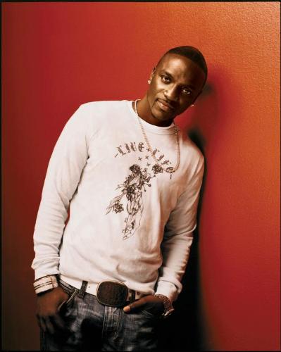 Akon - Akon in white t-shirt.