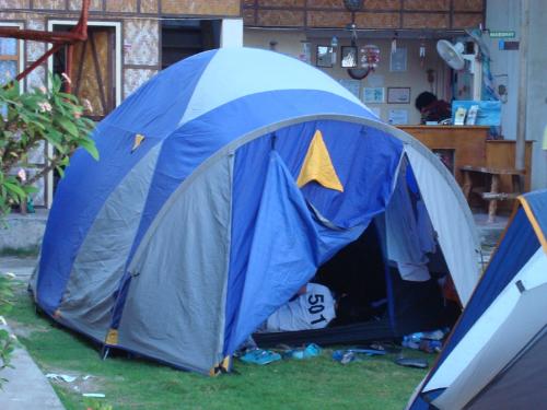 Camping outside the hotel - This is camping outside the hotel when the resort was fully booked and you don't have a place to stay, so camping is an alternative and it's fun too.