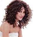 A curly hair style - A picture of woman in a curly hair style.