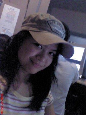myself - this was taken when i was still in first year college. i was bored at this time so i decided to take a shot of myself.:) the cap i'm wearing is of my friend (janot). they say that i look like a chinita here which i know i'm not.