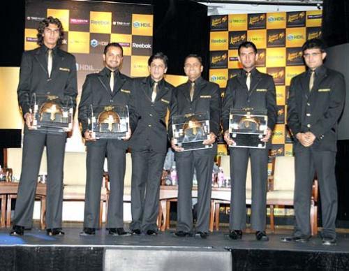 Kolkata Knight Riders - Kolkata Knight Riders are standing with trophy.