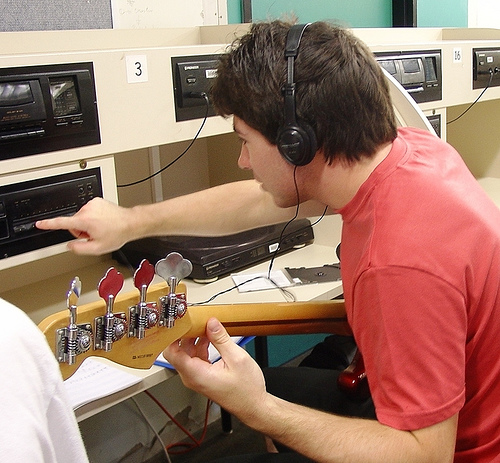 I'm a Bassist - A teenager figuring out the bass notes while listening to the music.