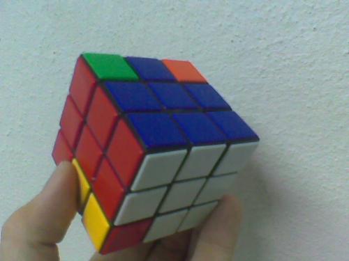 It's a Magic Cube!!! - Have you played this game before? I have solved it until this stage (as shown in the picture). Help me if you can :)
