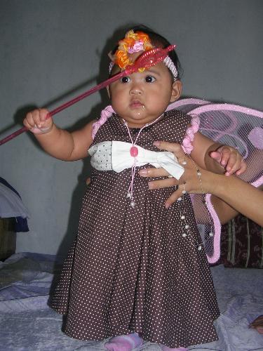 with an orange thingy on her forehead - my mom put that on! :))