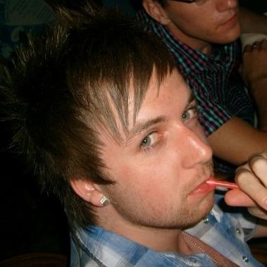 moi - This is a photo of me in turkey drinking from a 'fish bowl' (a mixture of alcohol and fruit juice). Good times :)