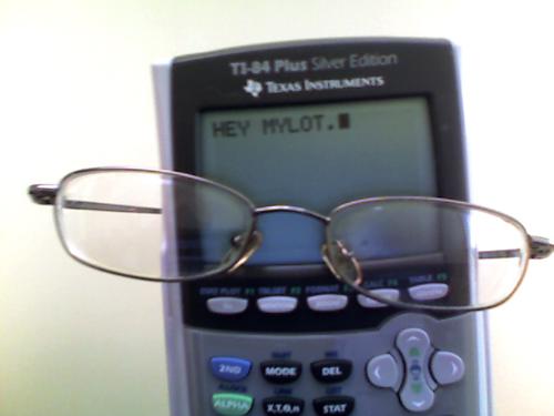 My glasses - My glasses. I am currently doing my math homework, so I decided to write a message on my calculator as well. :]