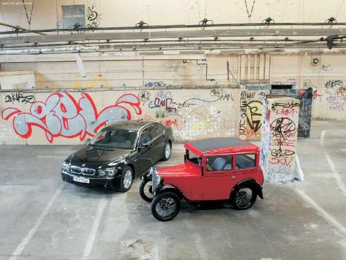 old vs new - olde age car and new gen car from bmw