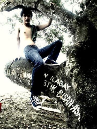 Living Freely - this photo was taken last week with my friends. and it shows my personality and how i live my life. haha i live on the tree.. joke!