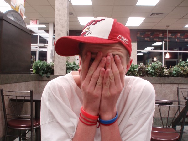 Me - Well, this is me in a McDonald's restaurant, hiding my face from who knows what.  It's almost as if I'm scared of the world, or crying or something.