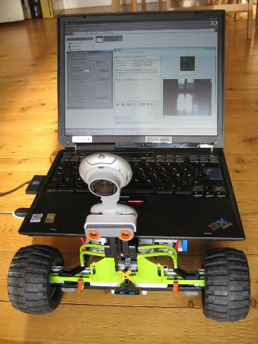 Laptop - Laptop in a toy car with a webcam attached.