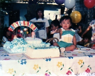 My only son's 1st Birthday - This photo was taken 21 years ago! It was when my little angel turned one year old. It was a very big party. All our relatives, friends and the whole neighborhood were invited to join the celebration.
