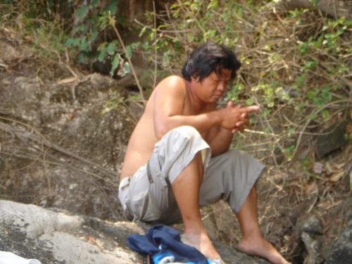 thinking - my officemate is thinking hard how can he go down the rock and fell asleep during the process....