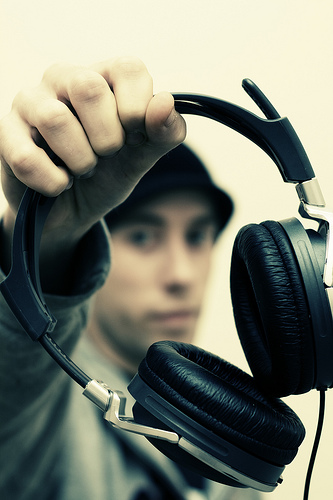 Check out his music - This teenager wants you to check out his music. Listen to it through this headphone.