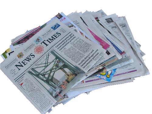 Photo of Newspapers - This is a photograph of newspaper, representing the media in this question regarding freedom of the press.