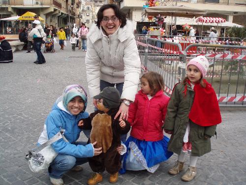kids in italy - cute...very cute..the girl in blue jacket and the kids in animal uniform... taken during winter holiday in italy