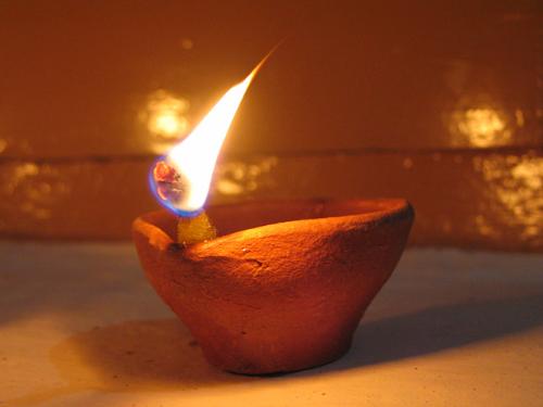A Happy and Prosperous Diwali ! - A clay lamp symbolising Diwali which is the Festival Of Lights!