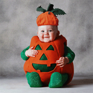 A baby in a costume - this is a cute photograph of a baby in a costume