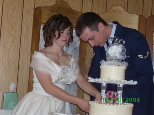 Cutting the Wedding Cake - My daughter and her husband cutting their wedding cake at the reception.