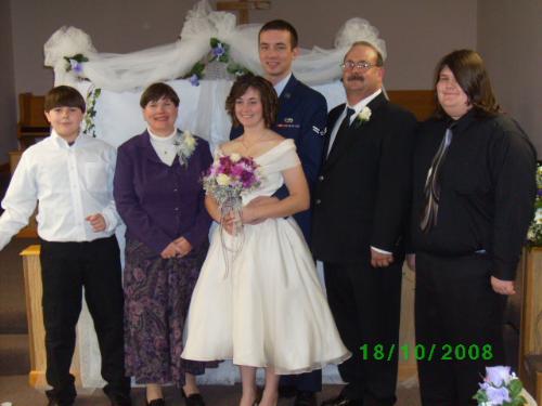 Bride and Groom with the Bride's Family - My daughter and her new husband with her parents and two brothers.