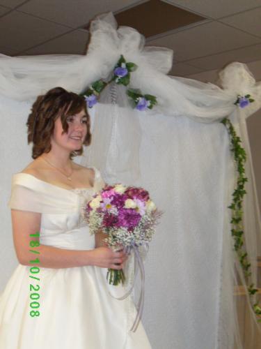 bride at wedding - The bride posing in the wedding chapel.