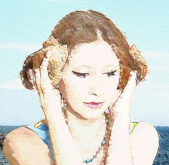 The Sound of Ocean - A teenager listening to the sound of ocean through a piece of shell.