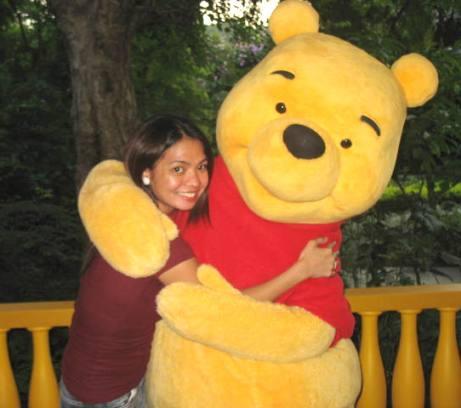 me with winnie - this was taken last year when we went to disneyland. it was so fun and very amazing to take a picture with one of my favorite characters. so cute! i felt like a child again.
