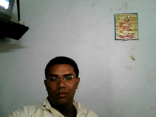malik - sitting in office